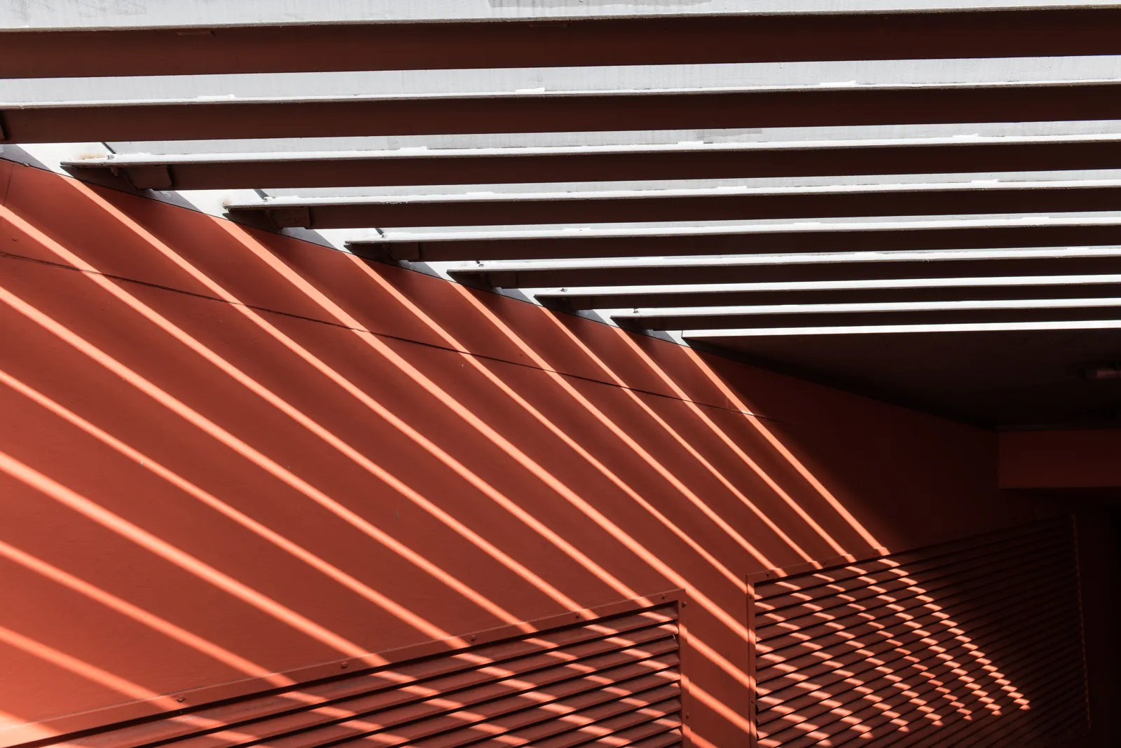 Warm light falling through slatted beams